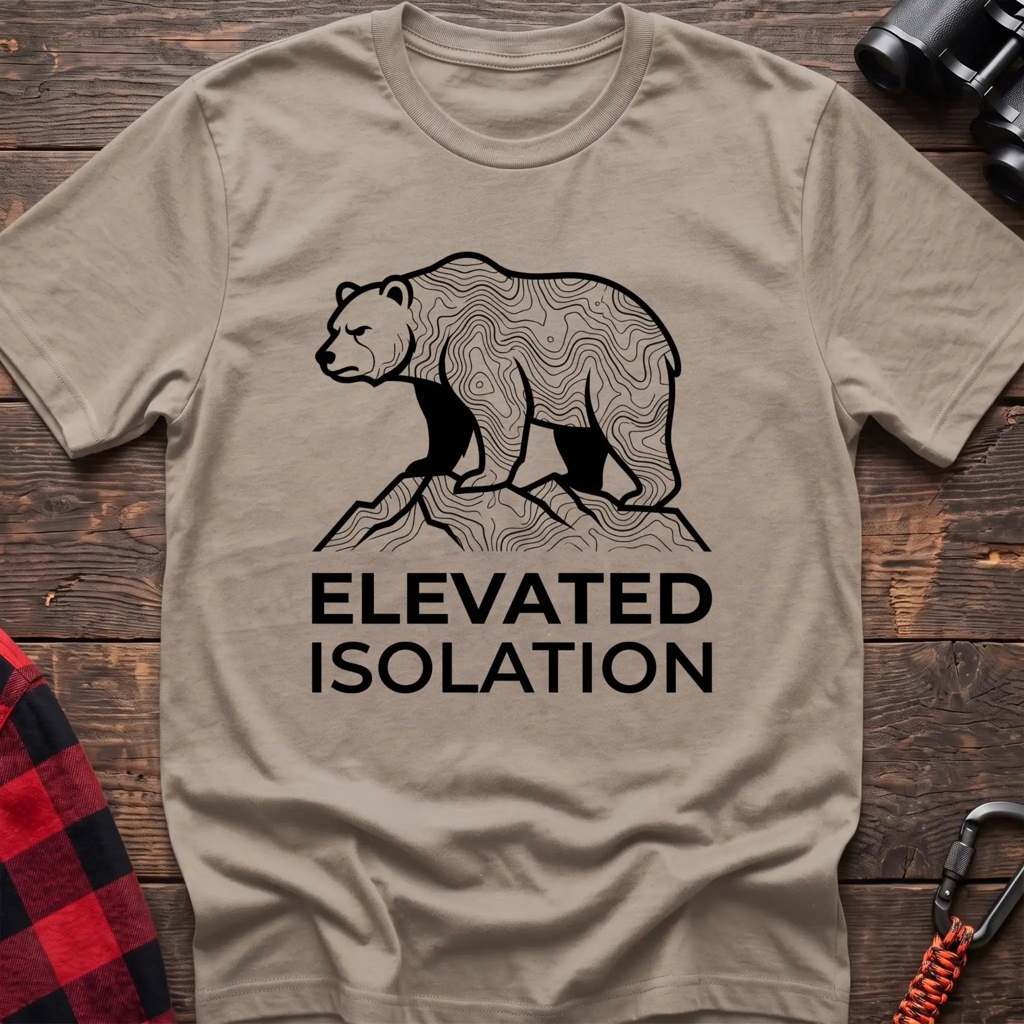Sand t-shirt with topographic bear standing on a mountain peak and the text Elevated Isolation