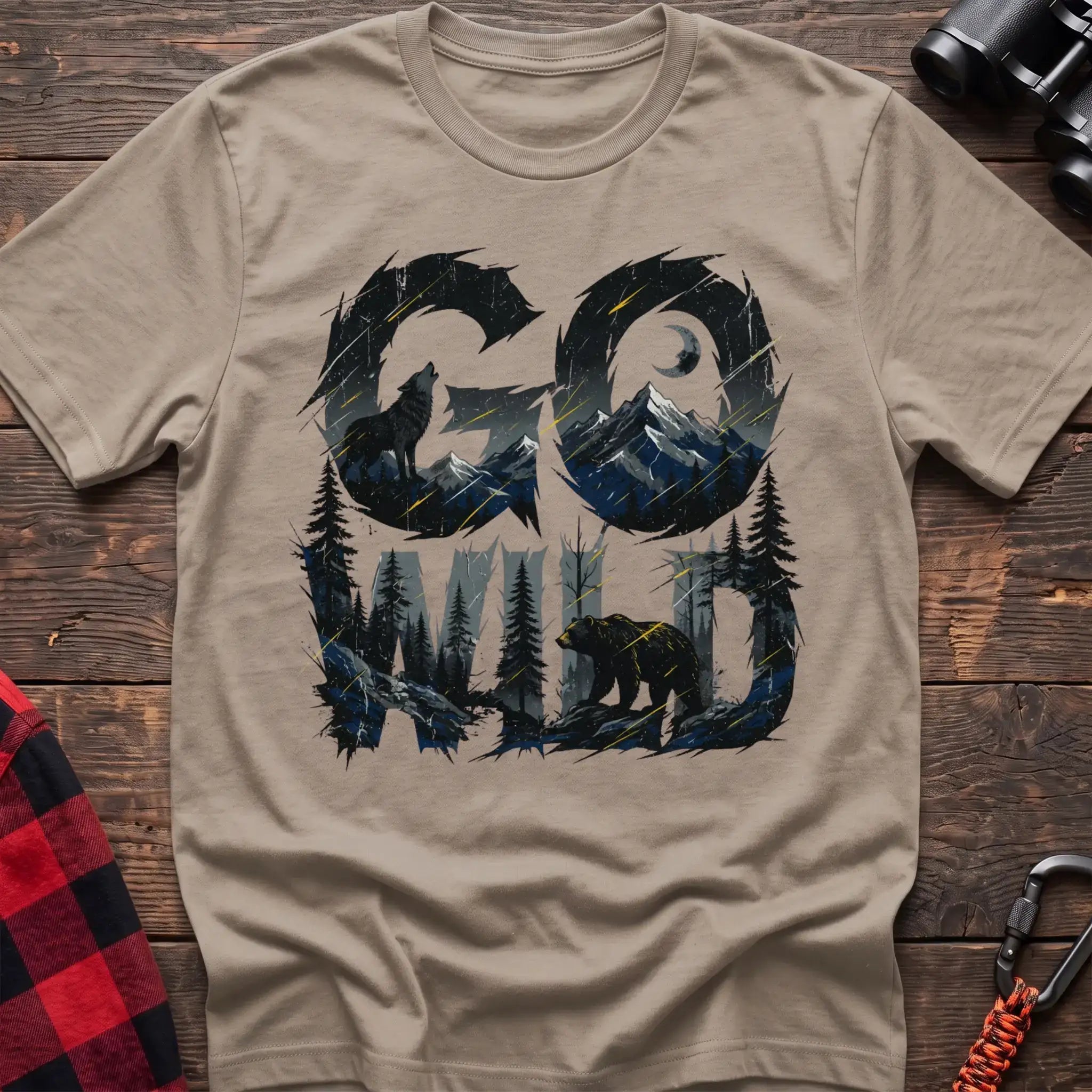 Sand t-shirt with wilderness scene of a howling wolf and bear integrated into the text Go Wild