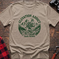 Sand t-shirt with circular graphic of a hiking mountain goat and the text Elevation Addict Trail Patrol