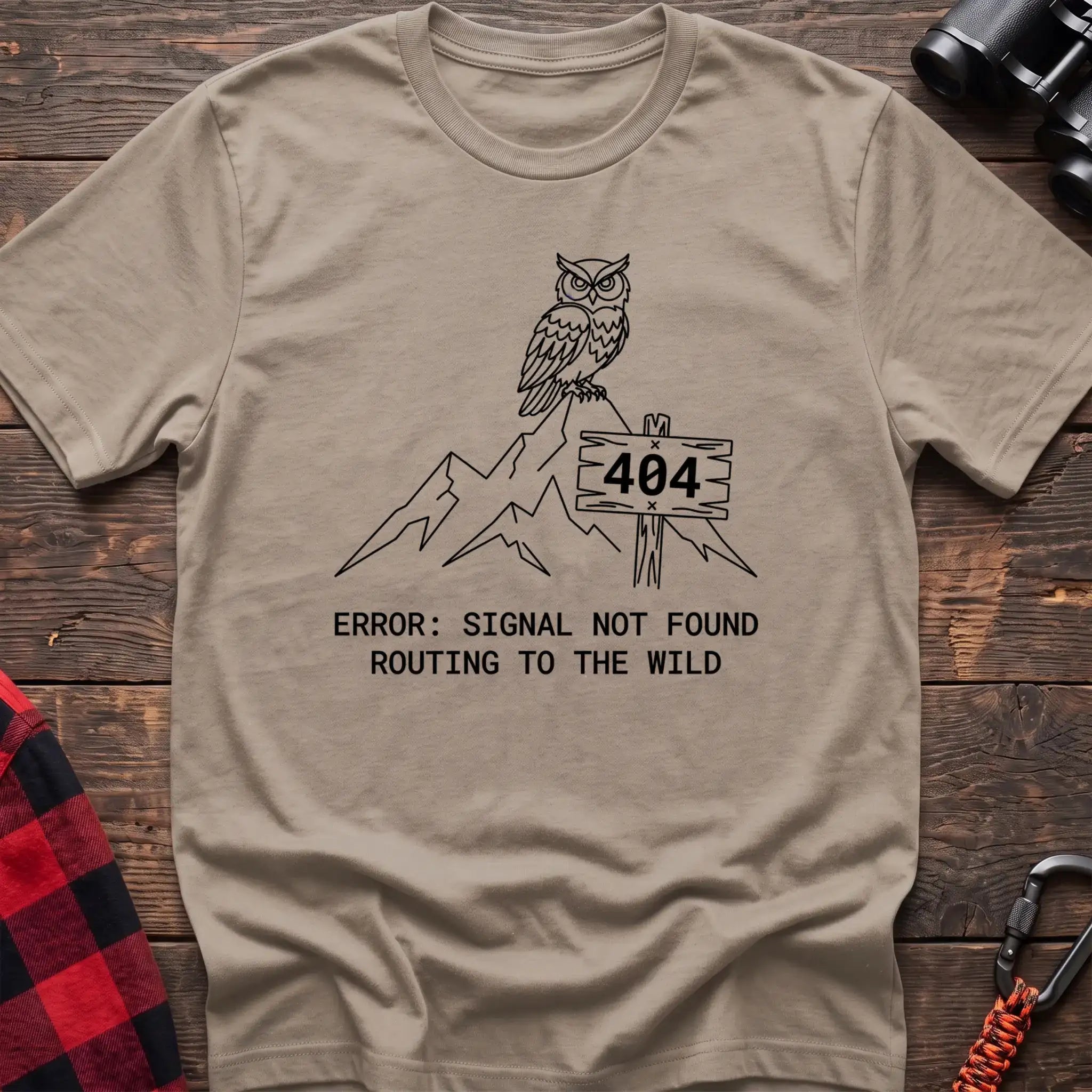 Sand t-shirt with owl on a mountain peak next to a 404 sign and the text Error Signal Not Found Routing to the Wild