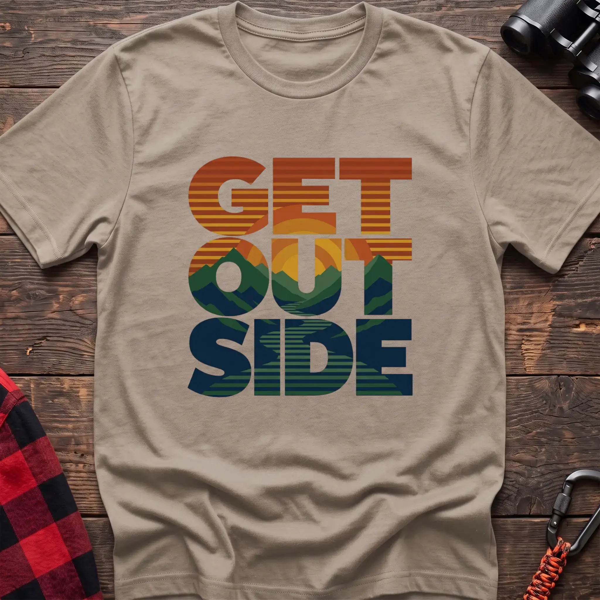 Sand t-shirt with retro sunset and mountain graphic integrated into the text Get Outside