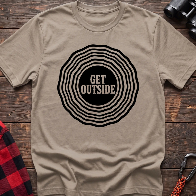 Sand hiking t-shirt with Get Outside text inside a black topographic ripple circle graphic
