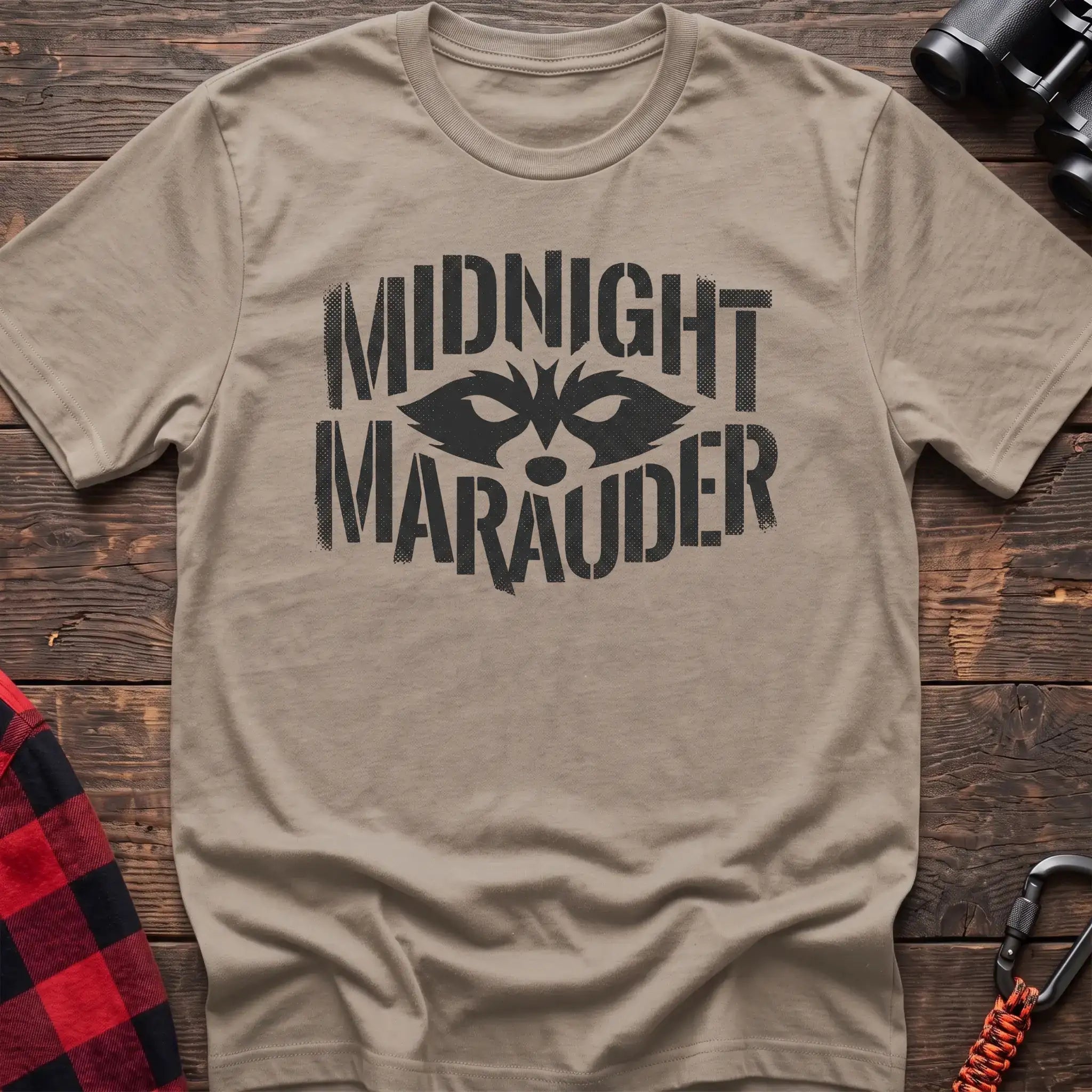 Sand t-shirt with dark raccoon face graphic and the text Midnight Marauder