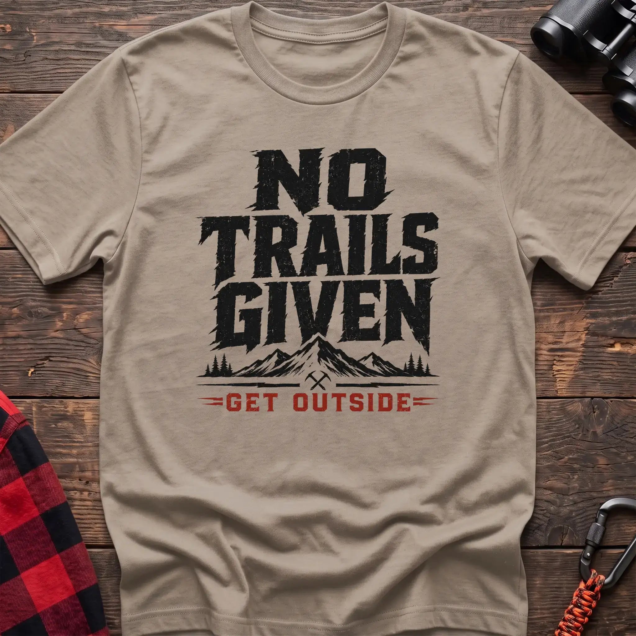 Sand t-shirt with distressed gray text reading No Trails Given above a mountain graphic and red Get Outside text