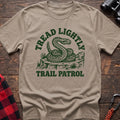 Sand t-shirt with dark green rattlesnake illustration and the text Tread Lightly Trail Patrol