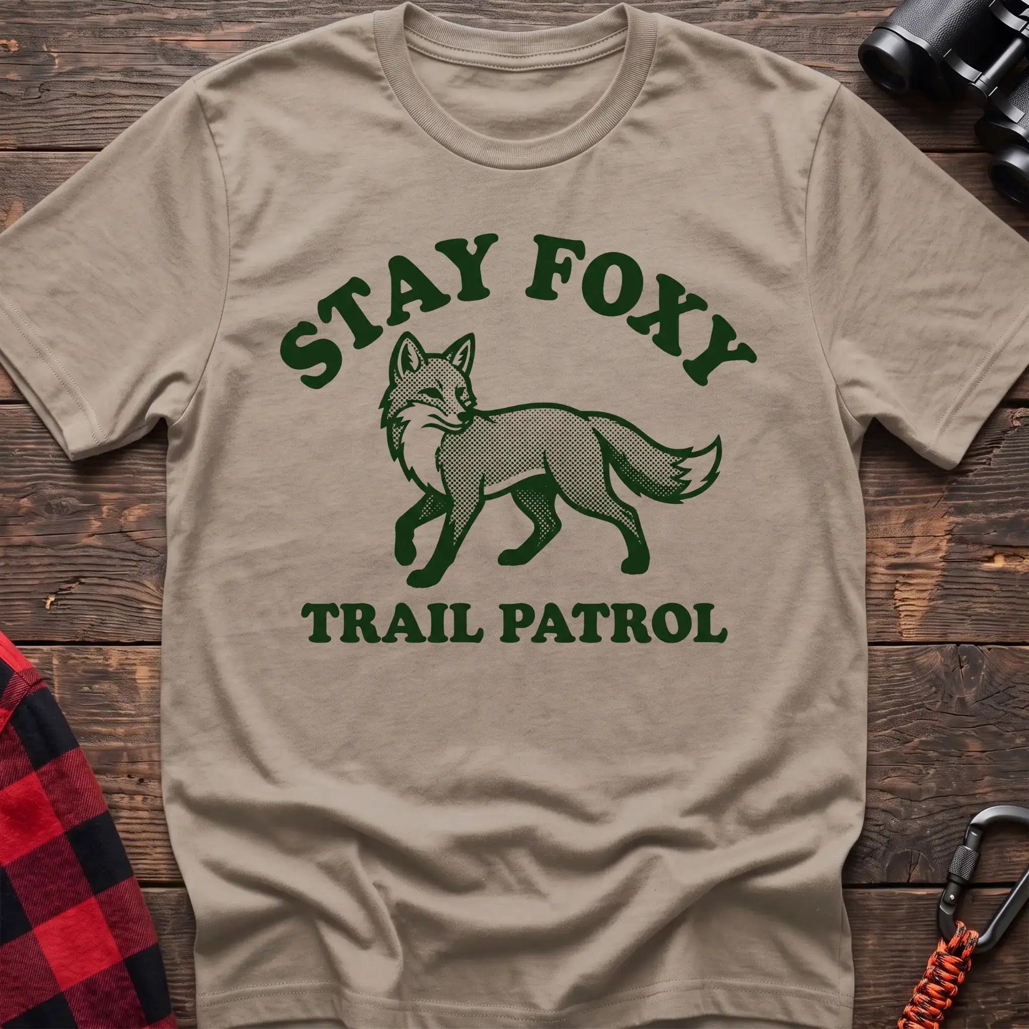 Sand t-shirt with dark green fox illustration and the text Stay Foxy Trail Patrol