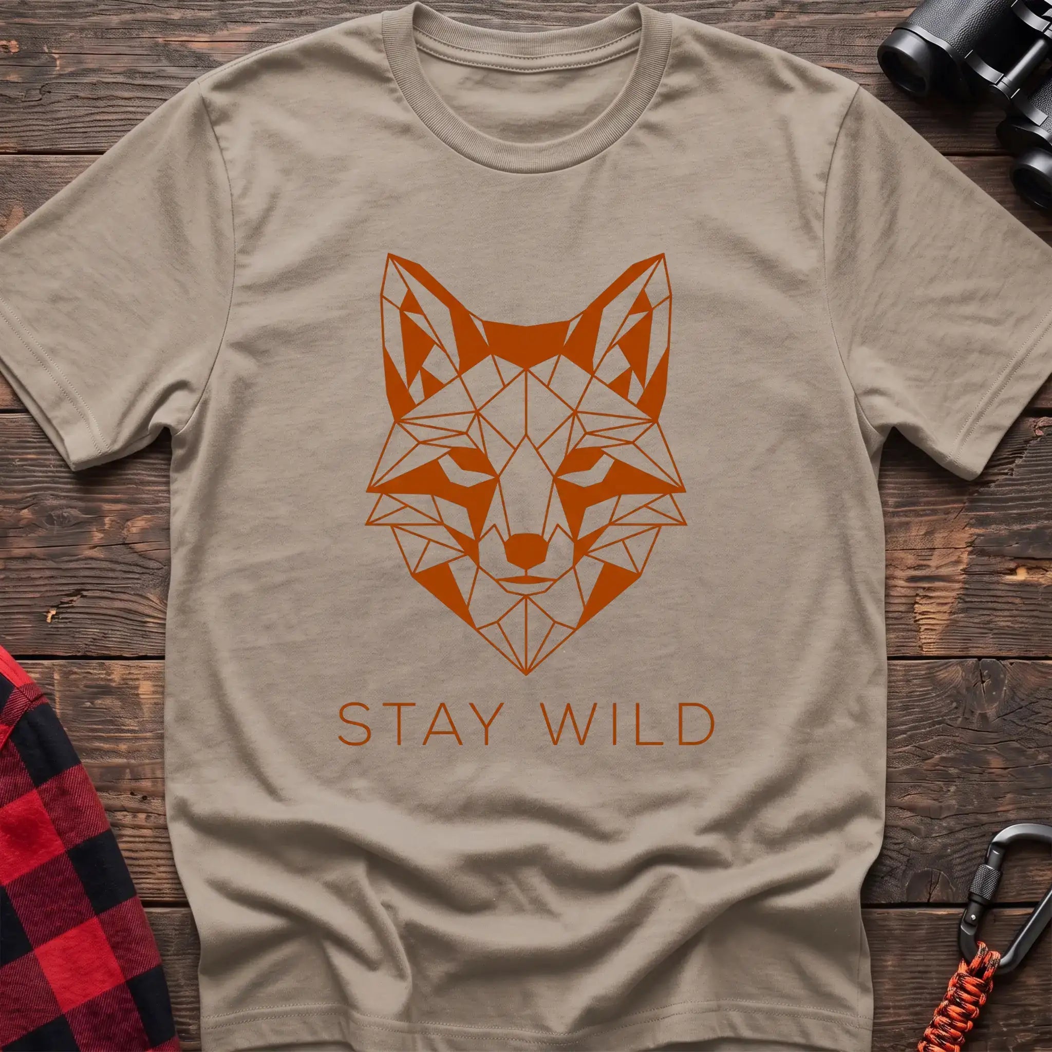 Sand t-shirt with geometric orange fox head graphic and the text Stay Wild