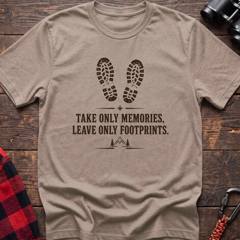 Sand hiking graphic T-shirt with boot prints and “Take only memories, leave only footprints” trail design