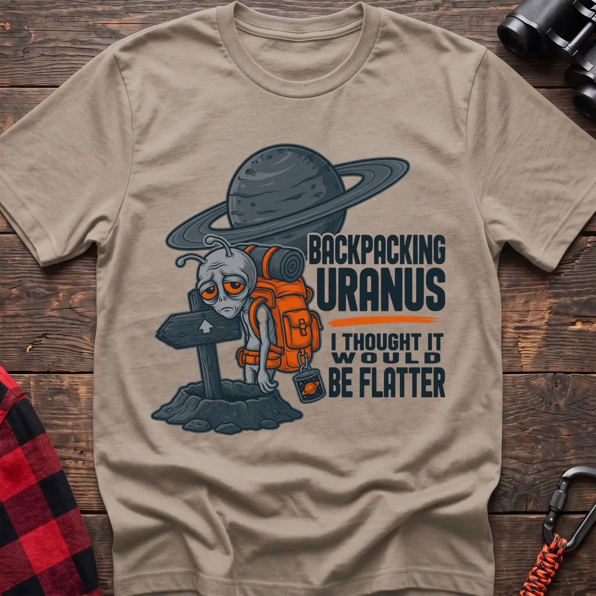 Sand t-shirt with tired alien backpacker next to a trail sign and the text Backpacking Uranus I Thought It Would Be Flatter
