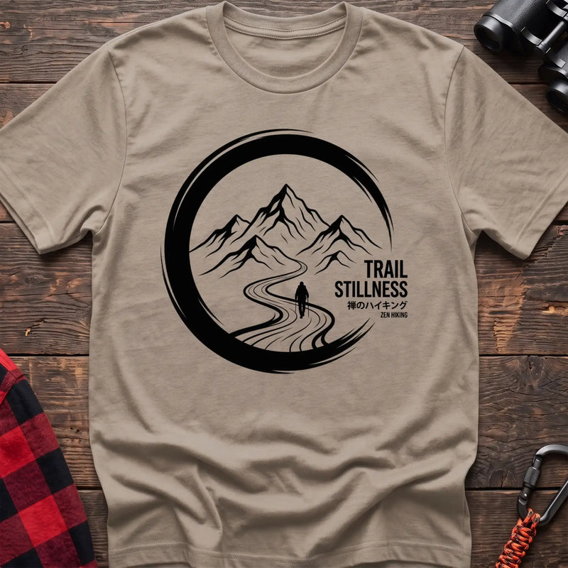 Sand t-shirt with circular mountain trail graphic of a hiker and the text Trail Stillness Zen Hiking