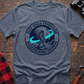 Stone blue t-shirt with circular badge graphic of an astronaut backpacking on Uranus, reading Deep Space Expedition Backpacking Uranus
