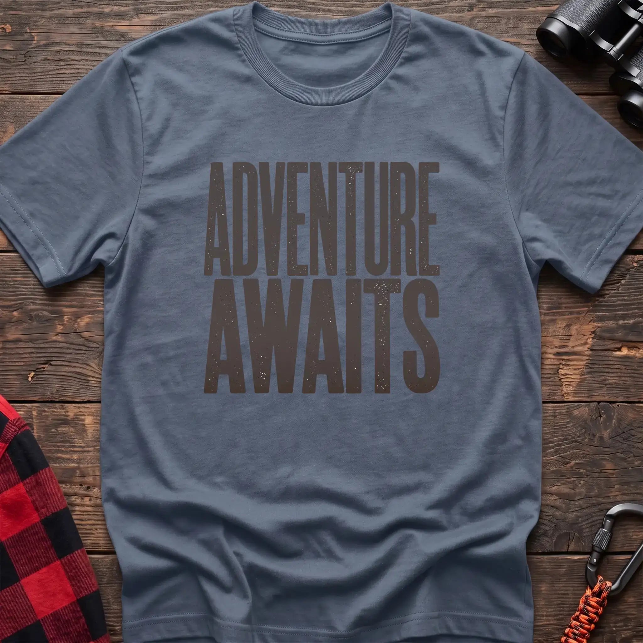 Stone blue t-shirt with large distressed gray text reading Adventure Awaits