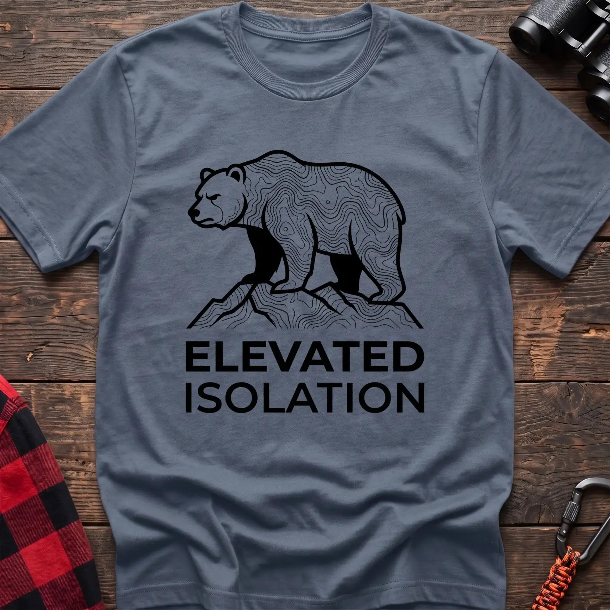 Stone blue t-shirt with topographic bear standing on a mountain peak and the text Elevated Isolation