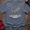 Stone blue t-shirt with detailed eagle perched on mountains graphic and the text Elevation Cult