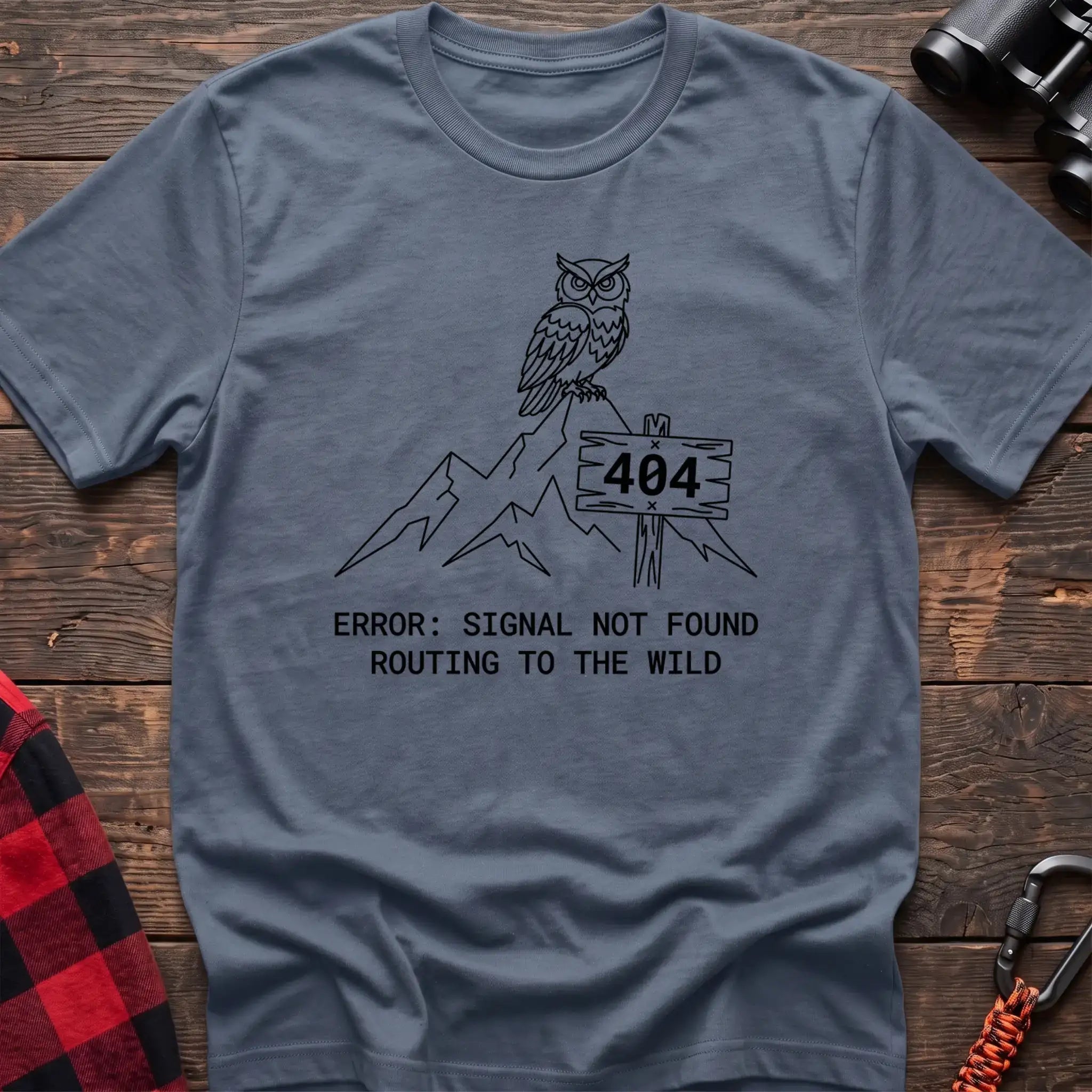 Stone blue t-shirt with owl on a mountain peak next to a 404 sign and the text Error Signal Not Found Routing to the Wild