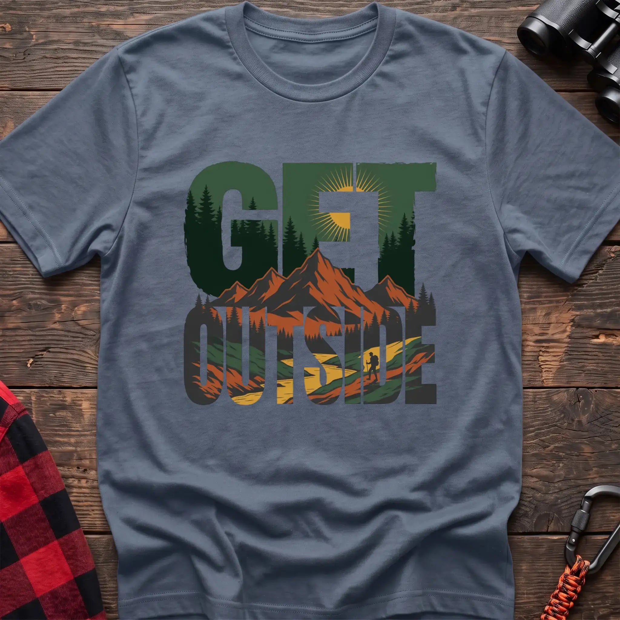Stone blue t-shirt with layered mountain landscape graphic integrated into the text Get Outside
