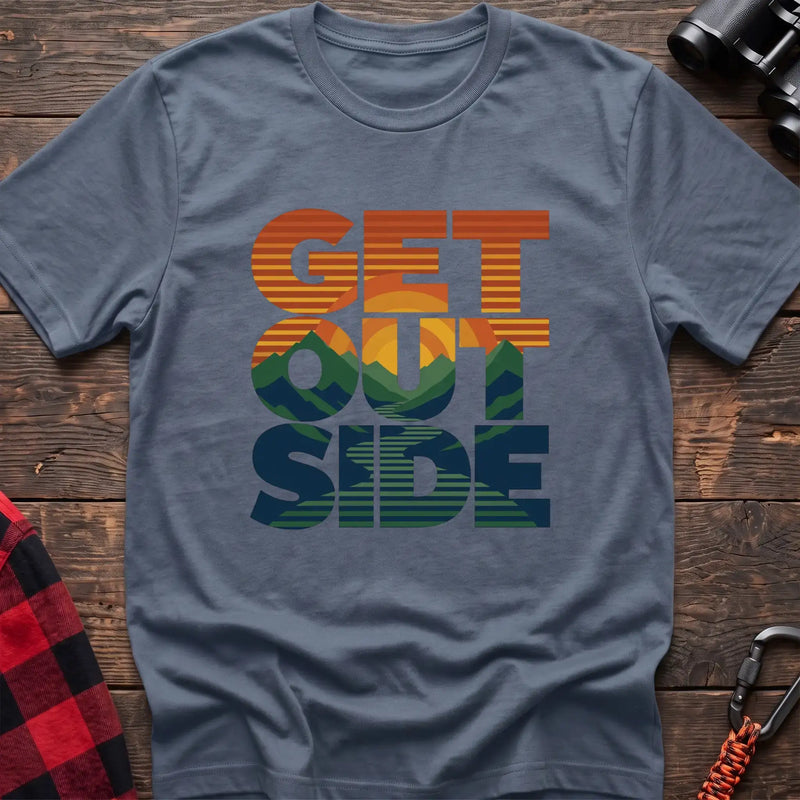 Stone blue t-shirt with retro sunset and mountain graphic integrated into the text Get Outside