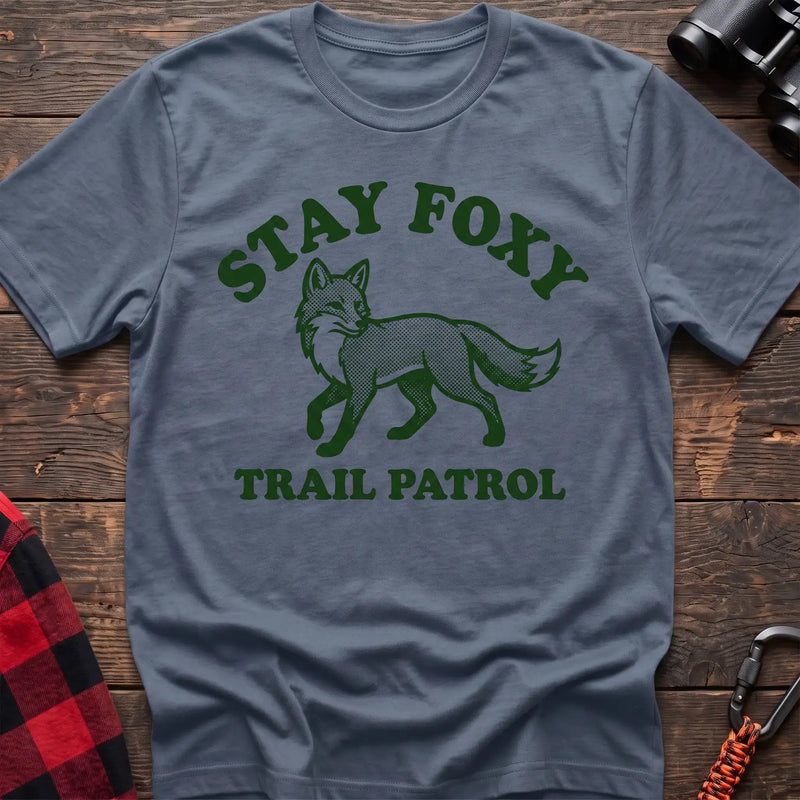 Stone blue t-shirt with dark green fox illustration and the text Stay Foxy Trail Patrol