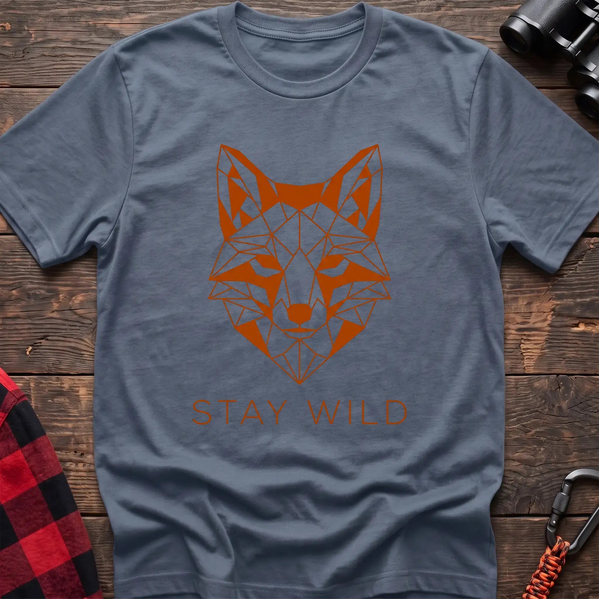 Stone blue t-shirt with geometric orange fox head graphic and the text Stay Wild