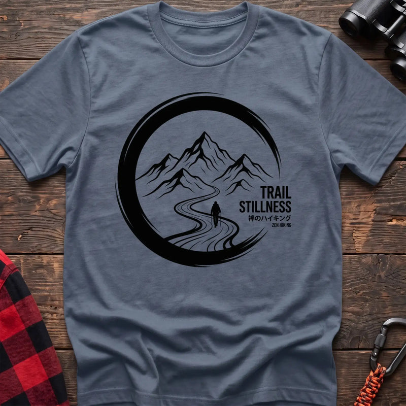 Stone blue t-shirt with circular mountain trail graphic of a hiker and the text Trail Stillness Zen Hiking