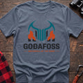 Stone blue cotton t-shirt with a basalt column graphic and Svartifoss Basalt and Bad Weather text on rustic wood