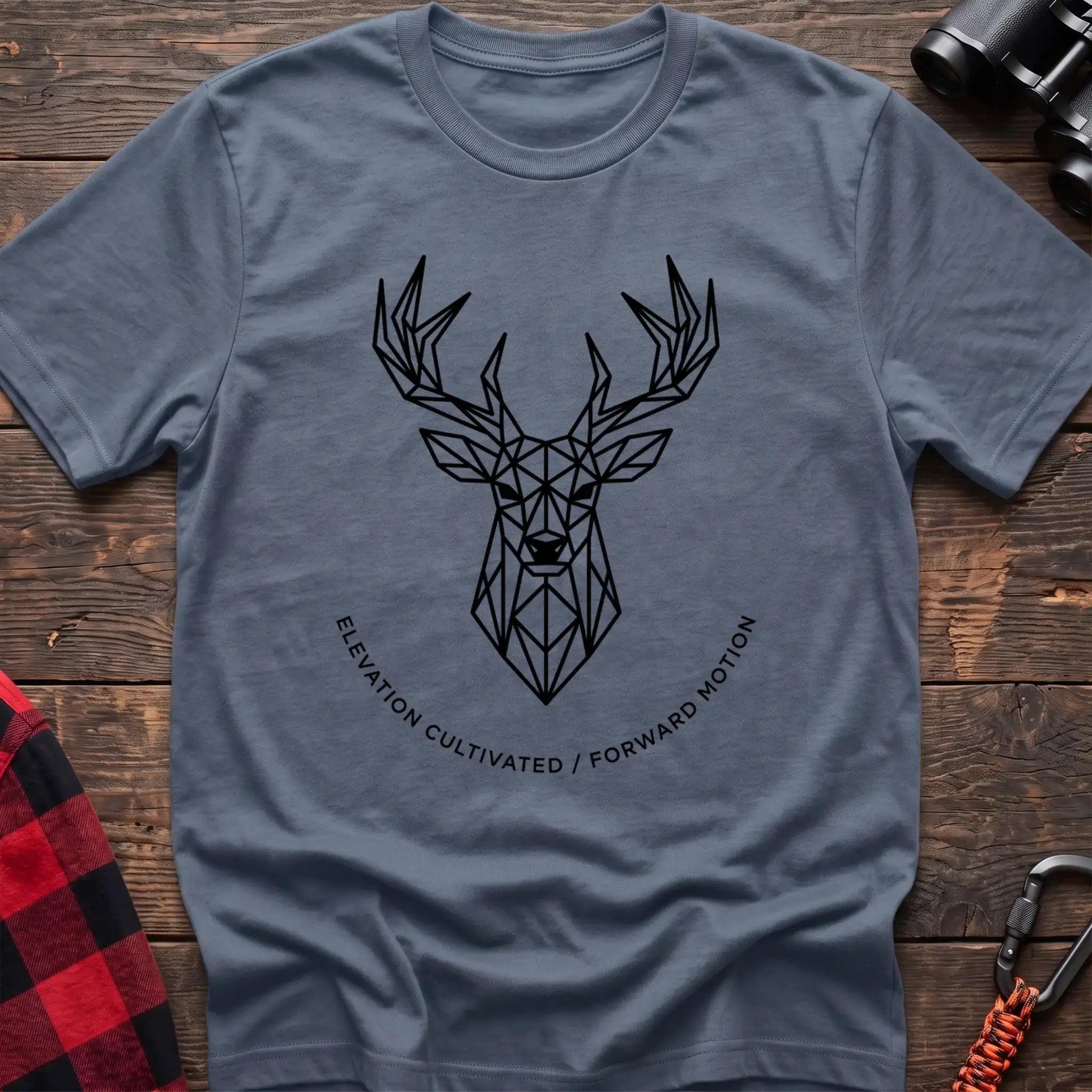 Stone blue t-shirt with geometric deer head graphic and the text Elevation Cultivated Forward Motion