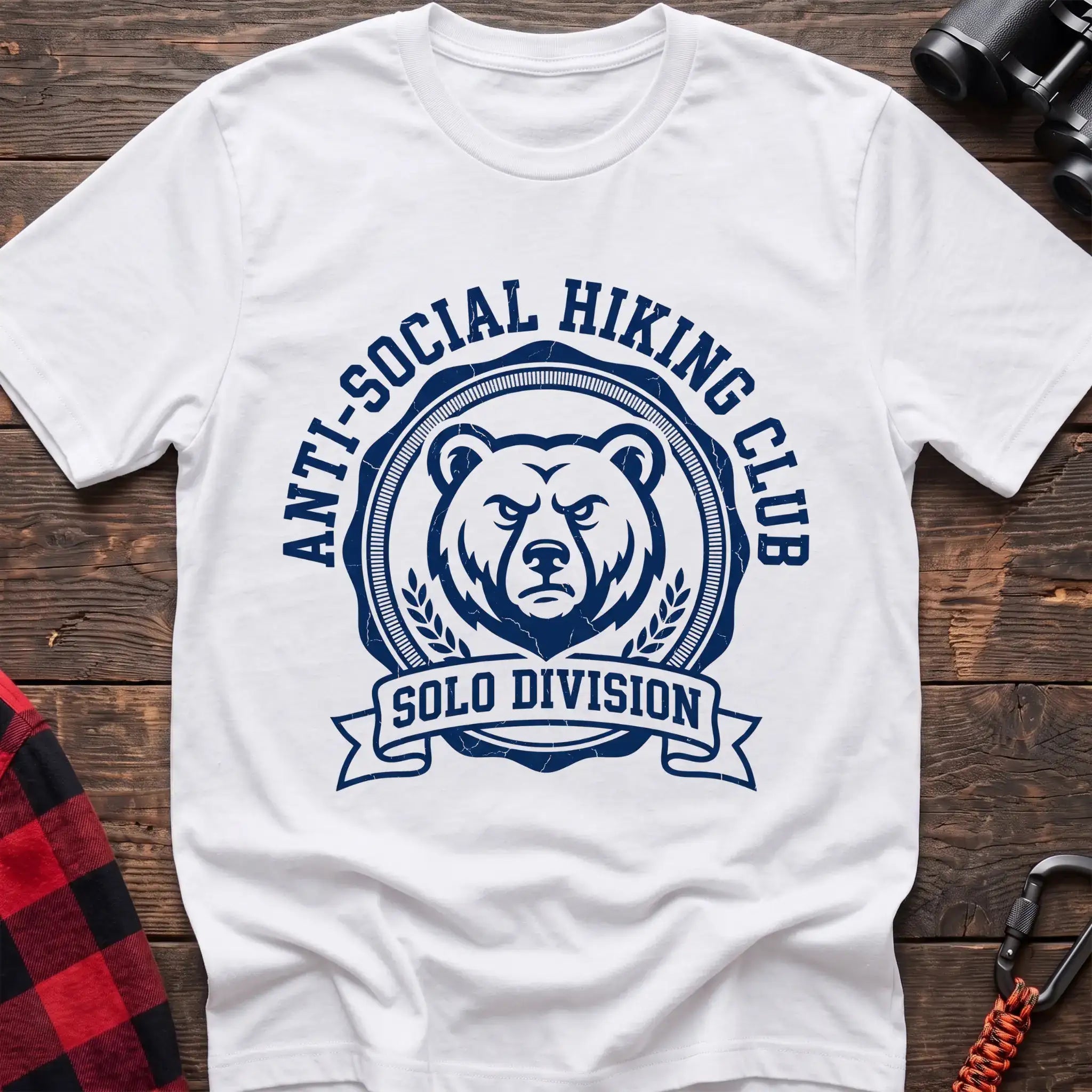 White t-shirt with circular badge of a serious bear face reading Anti-Social Hiking Club Solo Division