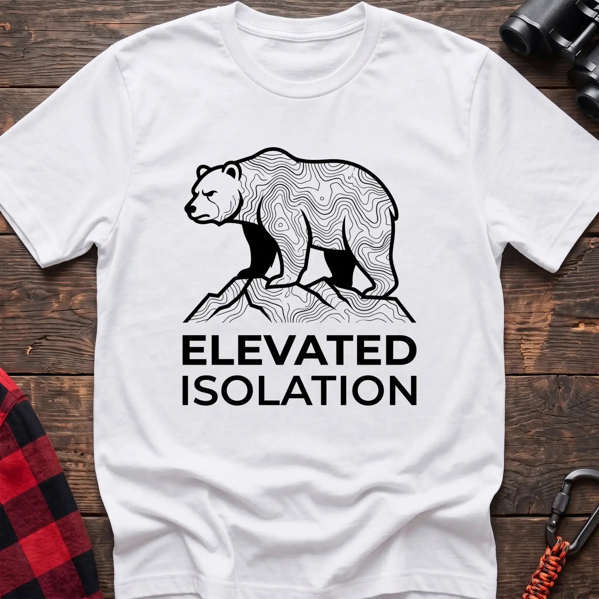 White t-shirt with topographic bear standing on a mountain peak and the text Elevated Isolation