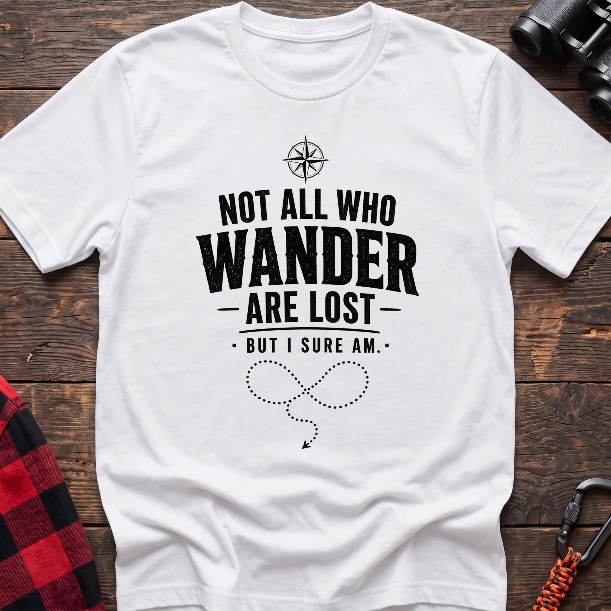 White cotton hiking t-shirt with compass, "Not all who wander are lost but I sure am" quote, and dotted wandering path graphic