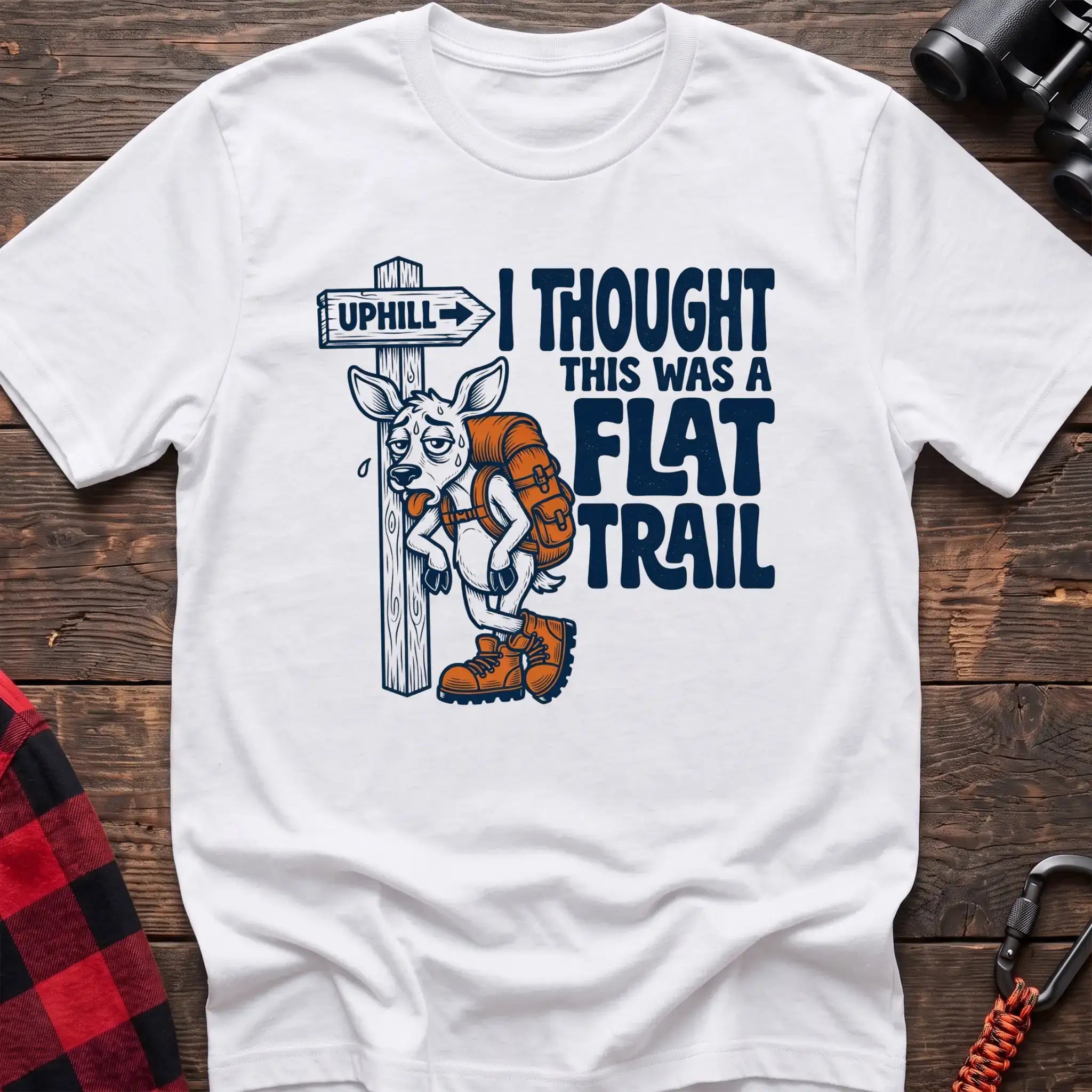 White t-shirt with exhausted deer leaning on an Uphill trail sign and the text I Thought This Was a Flat Trail