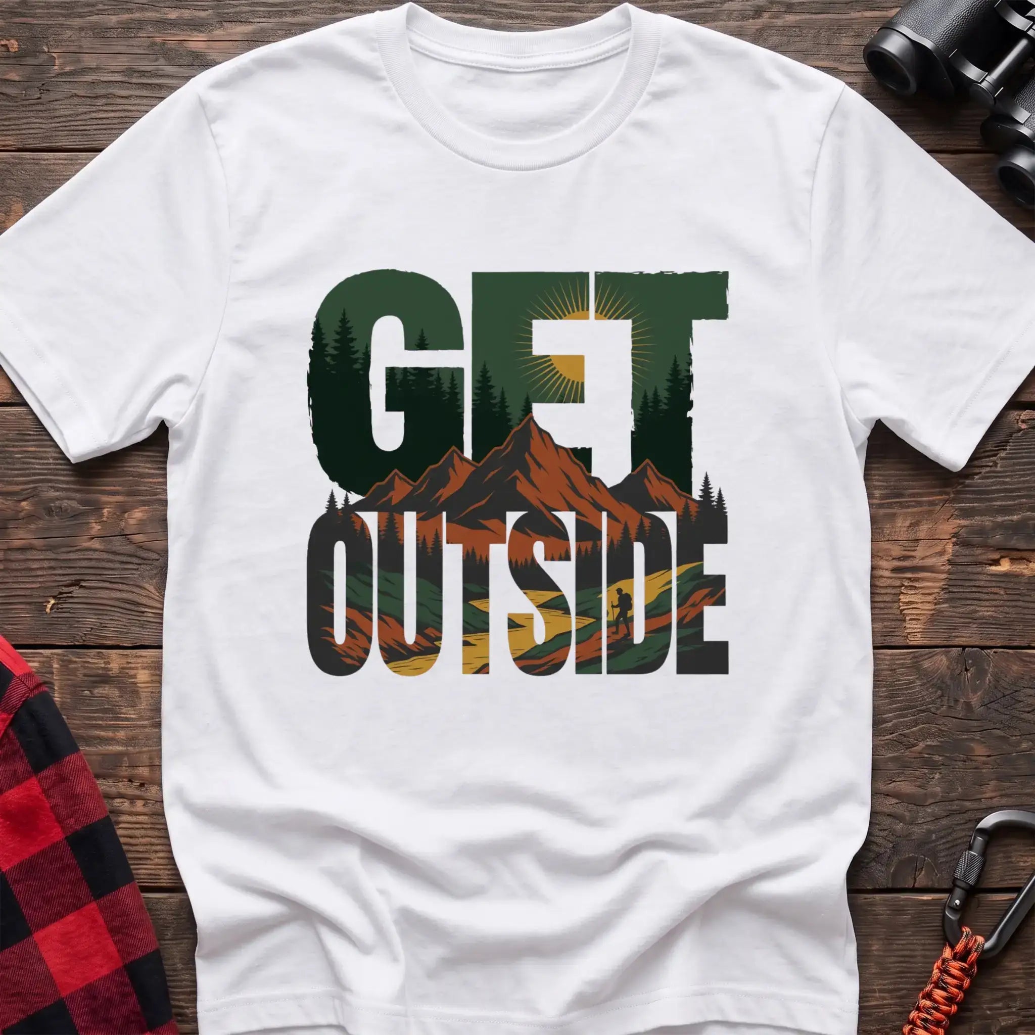 White t-shirt with layered mountain landscape graphic integrated into the text Get Outside