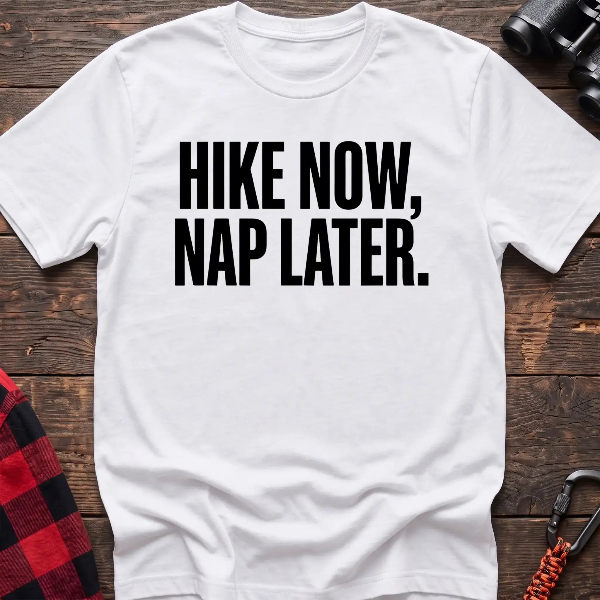 White t-shirt with bold black text reading Hike Now, Nap Later