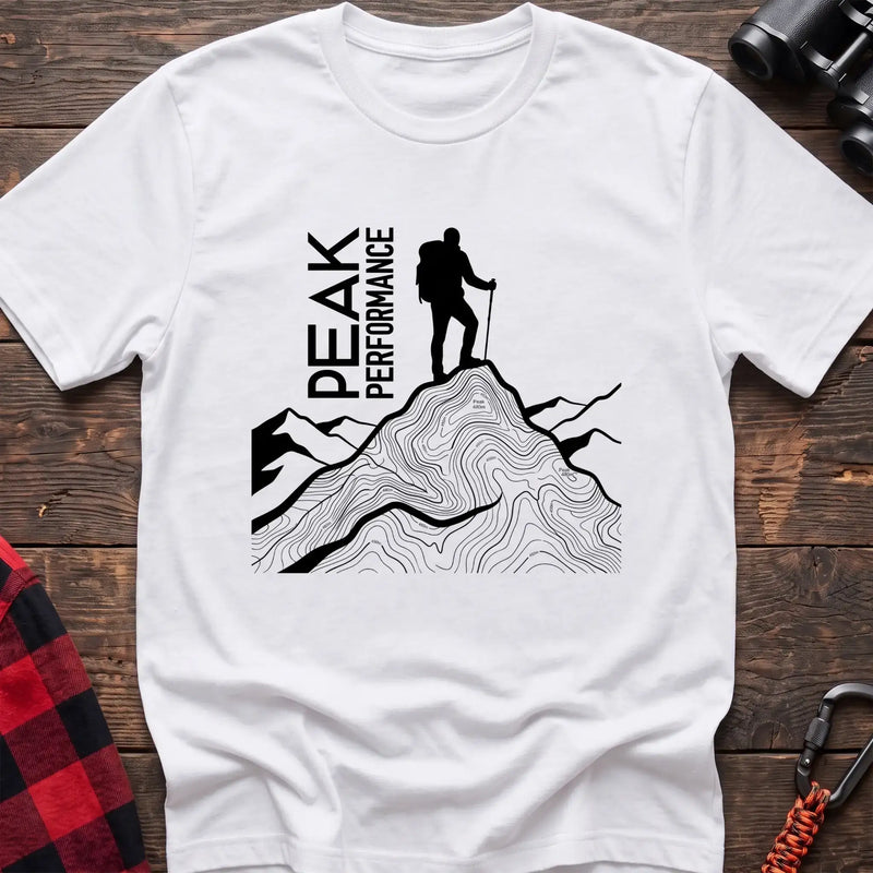 White t-shirt with hiker silhouette on a topographic mountain peak and the text Peak Performance