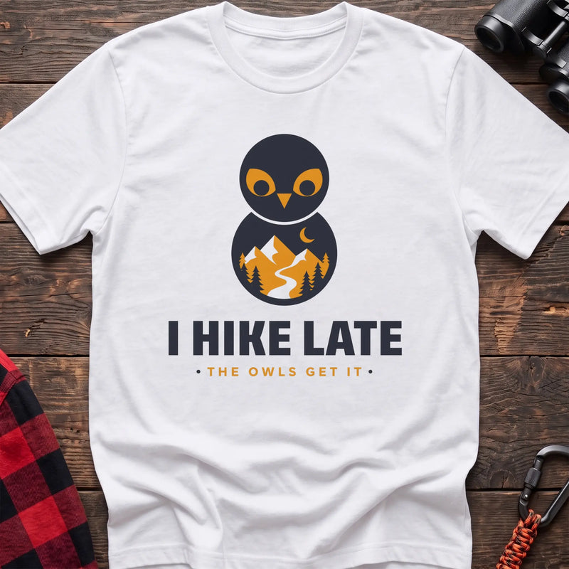 White hiking t-shirt with stacked owl graphic and the text “I Hike Late The Owls Get It”