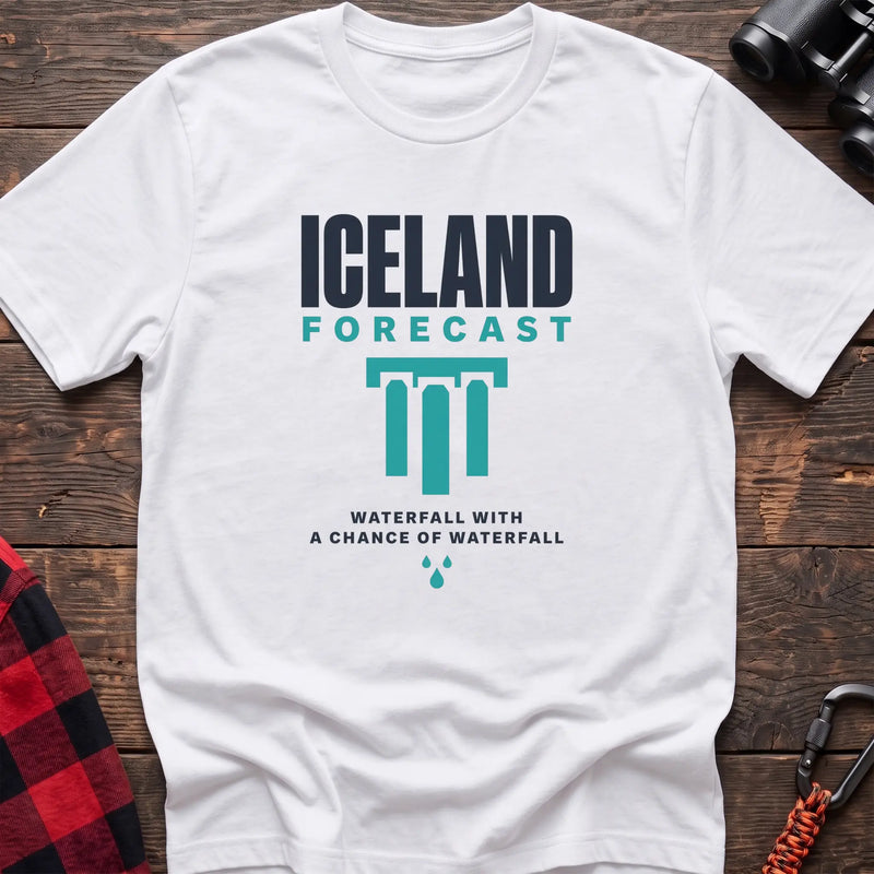 White cotton t-shirt with an Iceland Forecast graphic and Waterfall with a Chance of Waterfall text on rustic wood