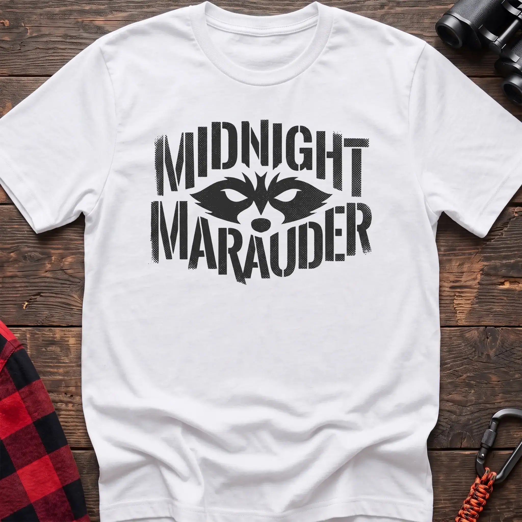 White t-shirt with dark raccoon face graphic and the text Midnight Marauder