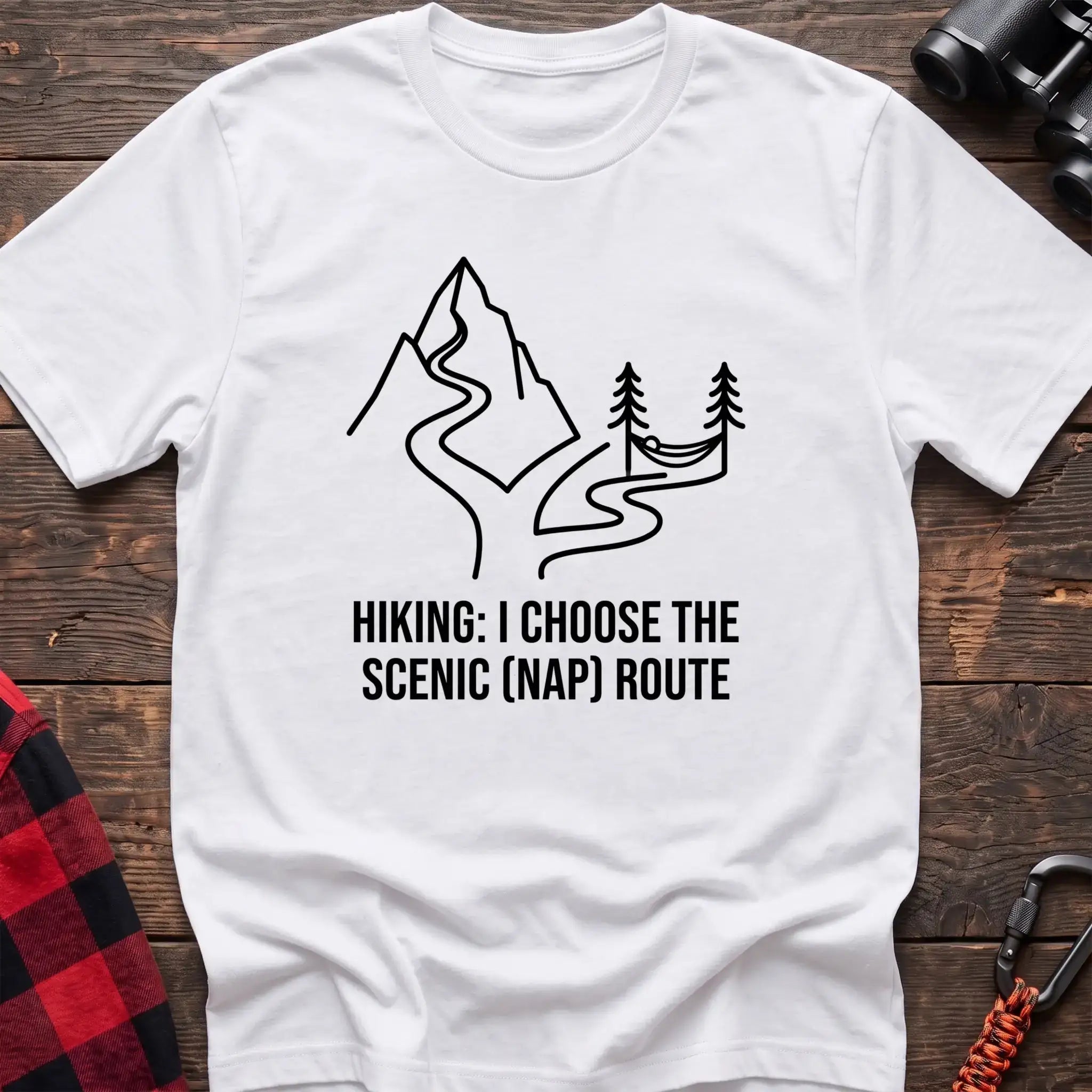 White t-shirt with minimalist mountain trail and hammock graphic reading Hiking I Choose the Scenic Nap Route