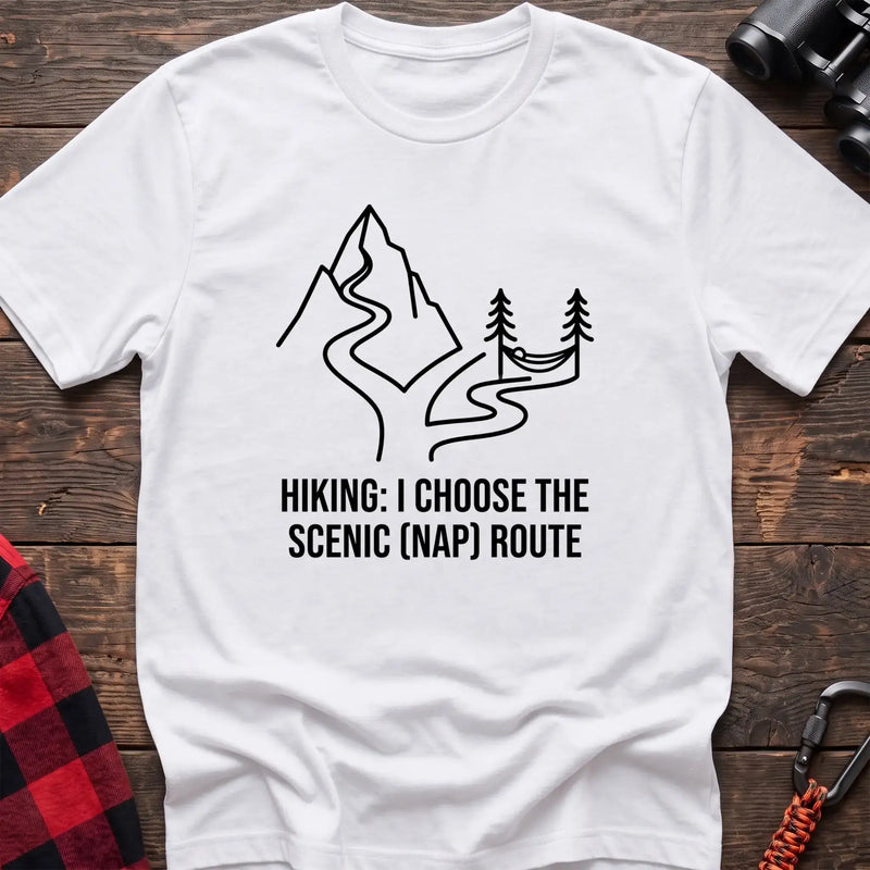 White t-shirt with minimalist mountain trail and hammock graphic reading Hiking I Choose the Scenic Nap Route