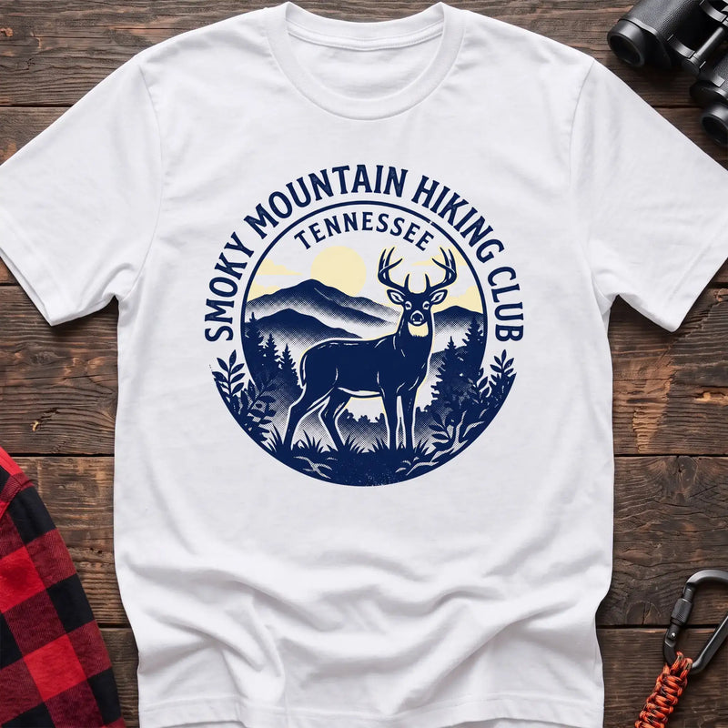 White t-shirt with circular badge graphic of a deer in the mountains reading Smoky Mountain Hiking Club Tennessee